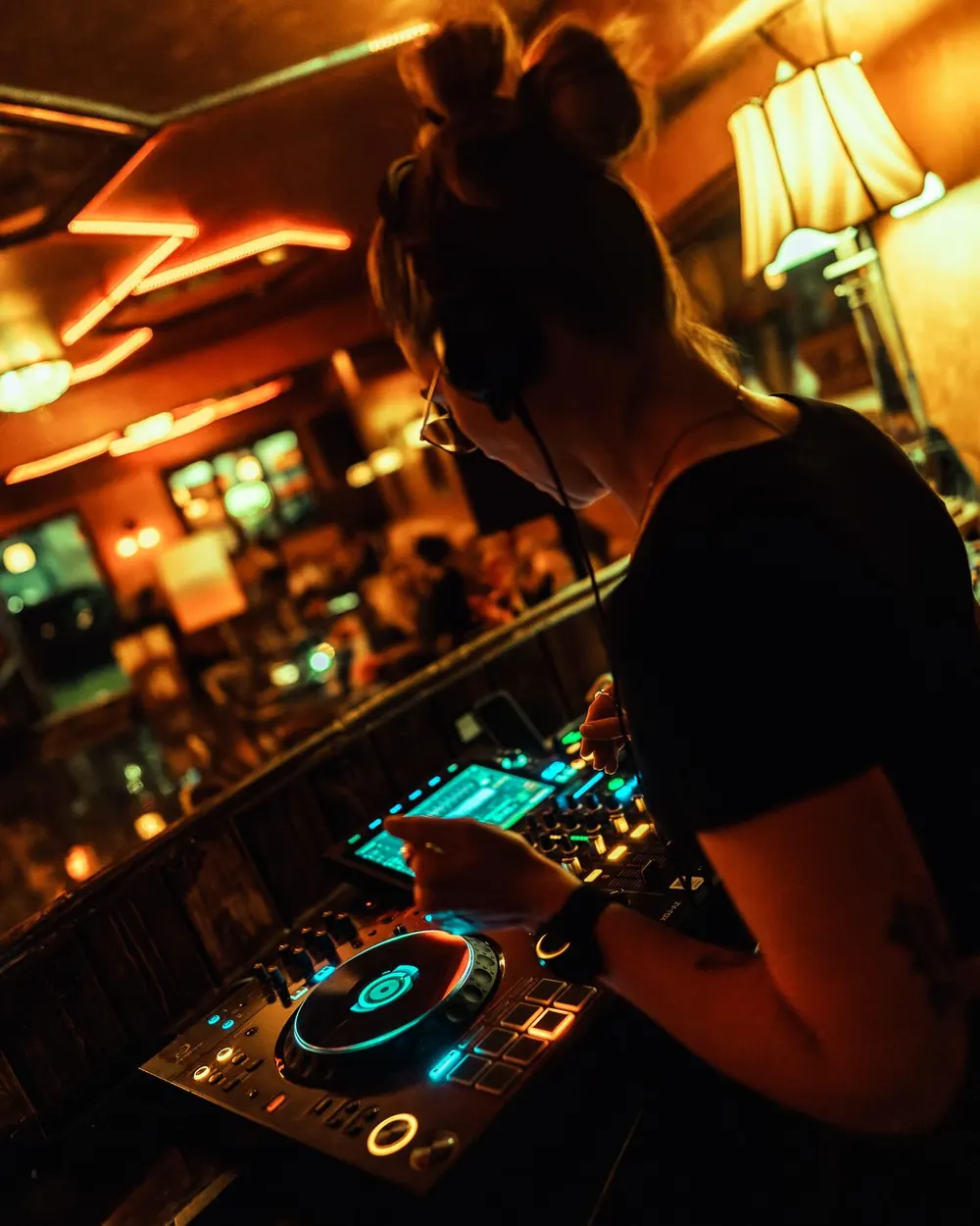 DJ behind the decks at Sip Haus