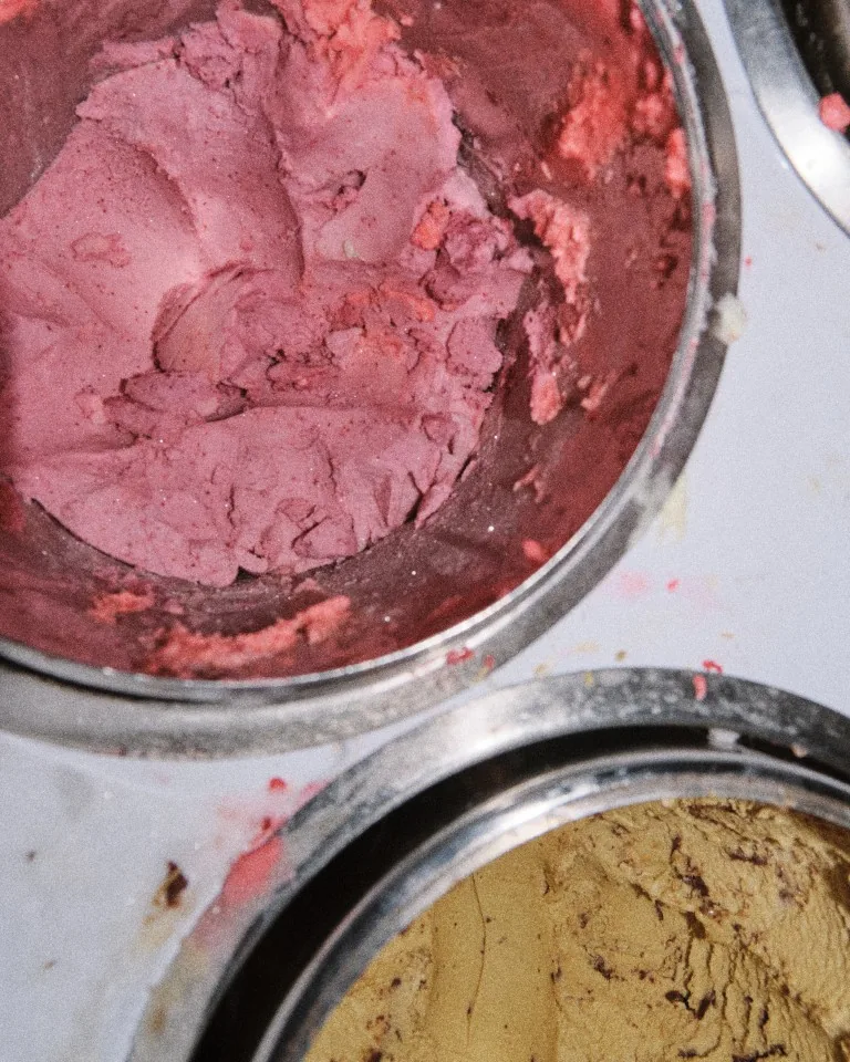 Close-up of strawberry gelato in the case