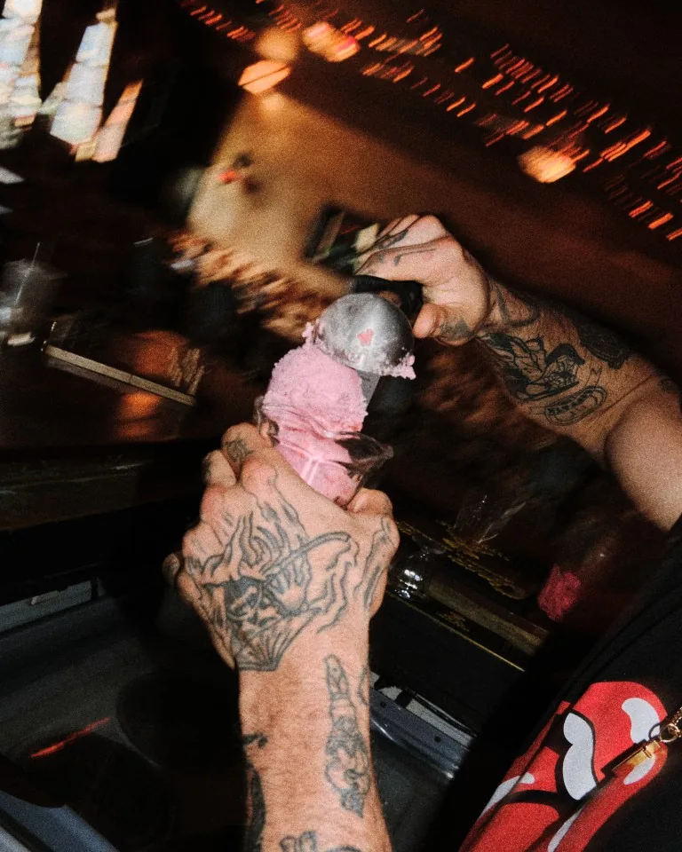 Strawberry gelato being scooped into a glass behind the Sip Haus bar