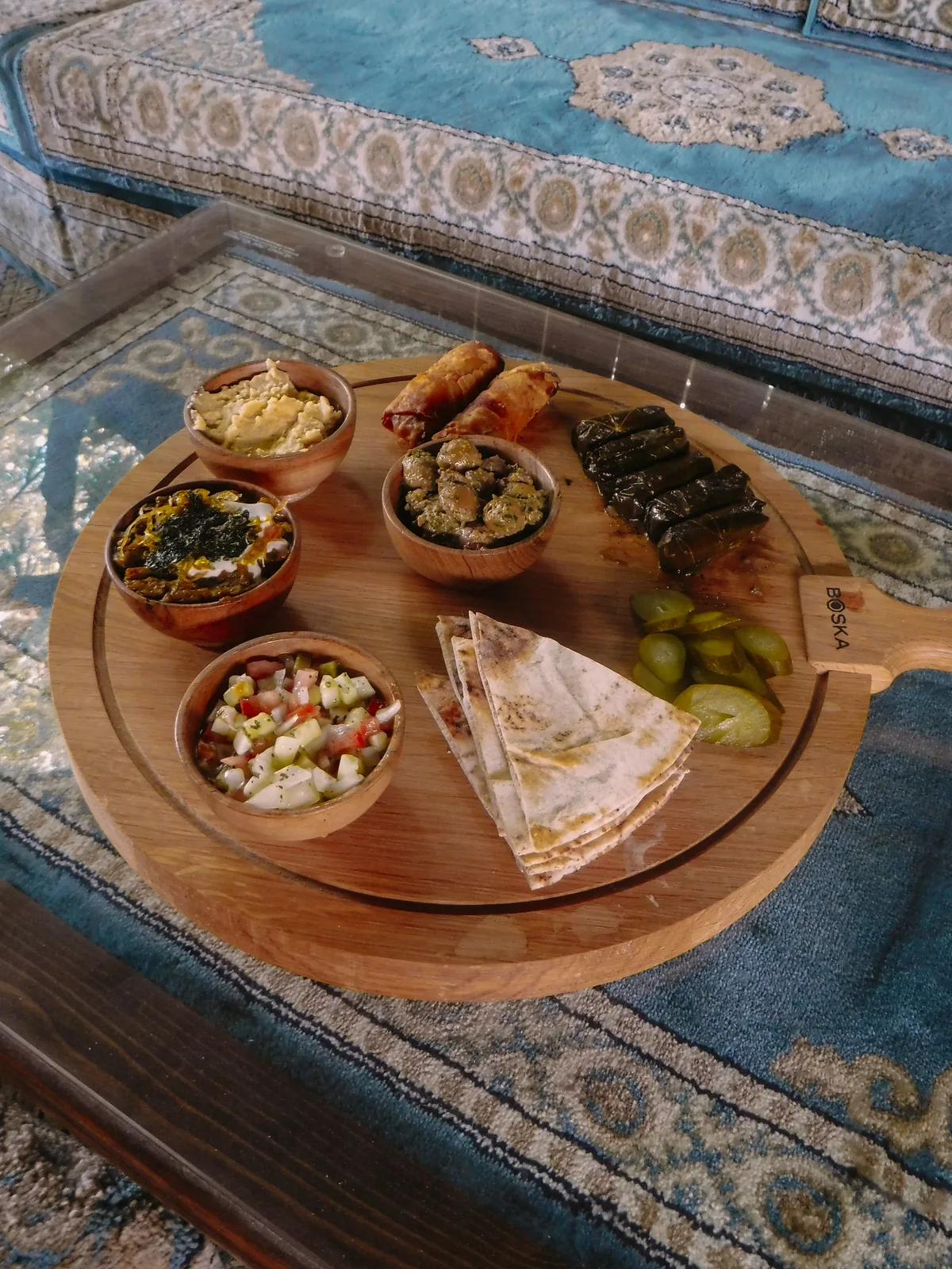 Persian Platter served on a glass table in the Sip Haus majlis room