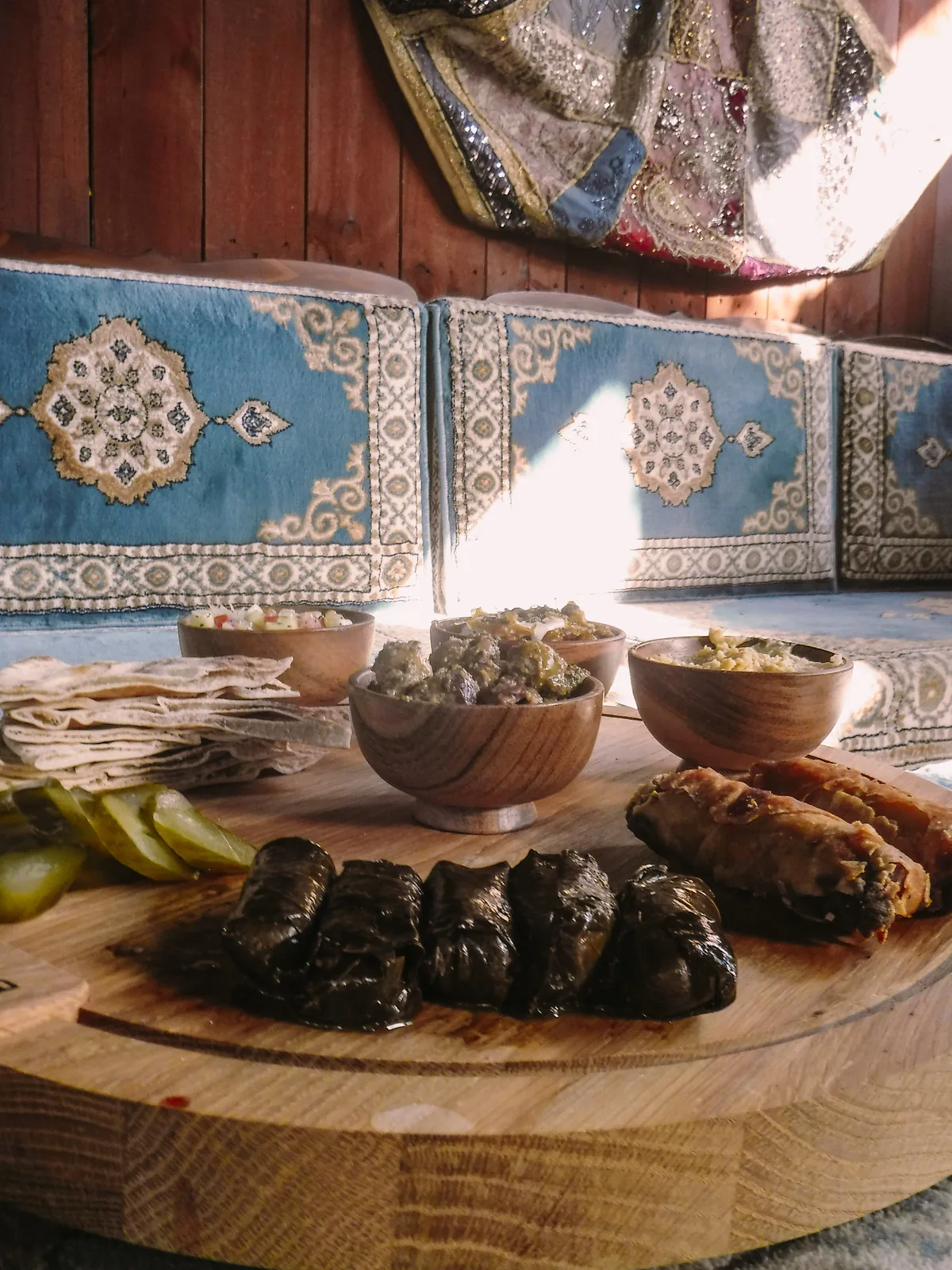 Dolma, eggrolls, dips and pita on the Sip Haus Persian Platter in the lounge