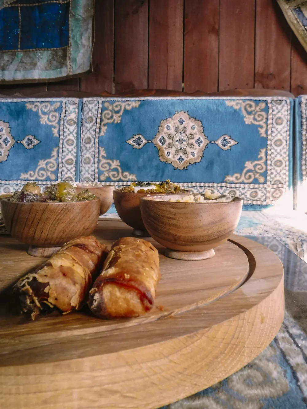 Close-up of eggrolls and dips on the Persian Platter